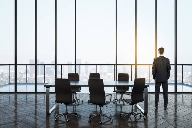 istock Businessman in modern conference room 1185890858