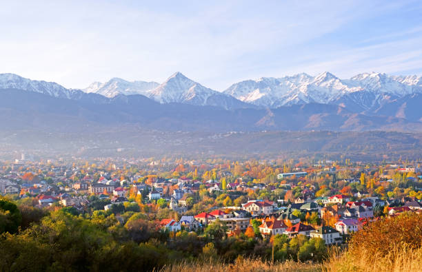 Almaty City Panorama Mountains Panoramic view of the upper part of Almaty city on the background of mountains in autumn season; golden fall, beauty and greatness of Kazakhstan concept almaty photos stock pictures, royalty-free photos & images