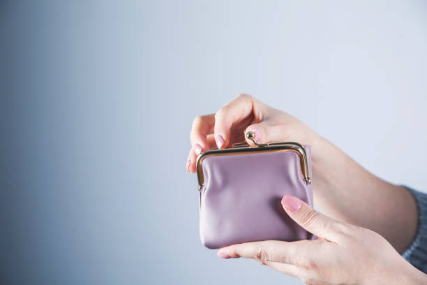 istock woman hand wallet 1185894680