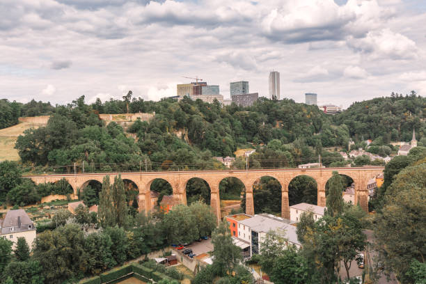 istock Luxembourg modern city and old arch railway bridge 1185897301