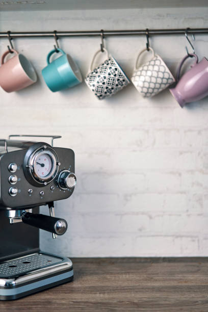 istock Mugs and Espresso Machine in Domestic Kitchen 1185897402