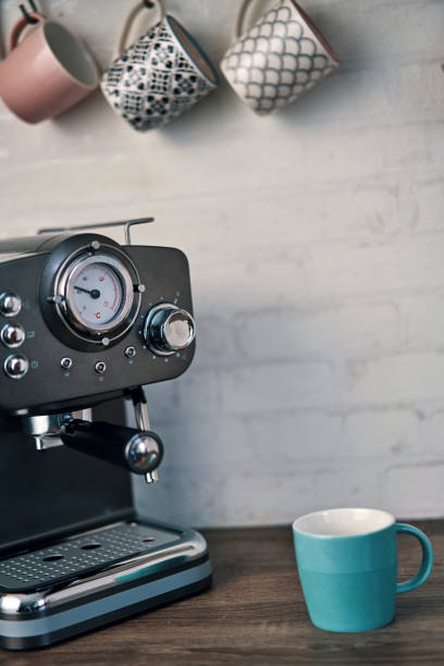 istock Mugs and Espresso Machine in Domestic Kitchen 1185897412
