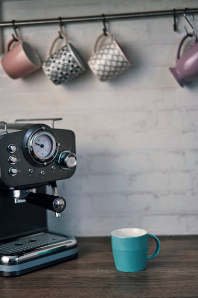 istock Mugs and Espresso Machine in Domestic Kitchen 1185897416
