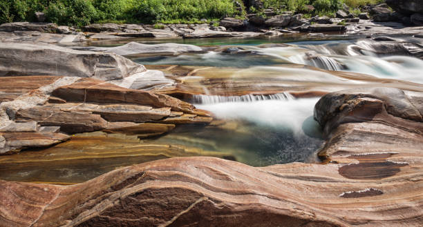 river and valley verzasca in switzerland with washed out rocks - riverbed switzerland valley stone imagens e fotografias de stock