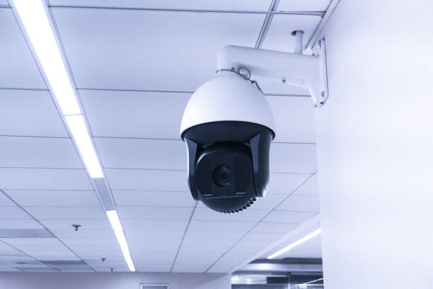 istock Security CCTV camera or surveillance system in building ,Closed-circuit television 1185900384