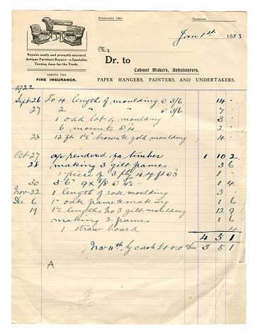 A handwritten bill from a cabinet maker and upholsterer, who was also a paper hanger, painter and decorator and funeral director. The bill is dated 1st January 1923, though it was made out the previous year and appears for the making and supplying of picture frames. (Identifying details removed.)