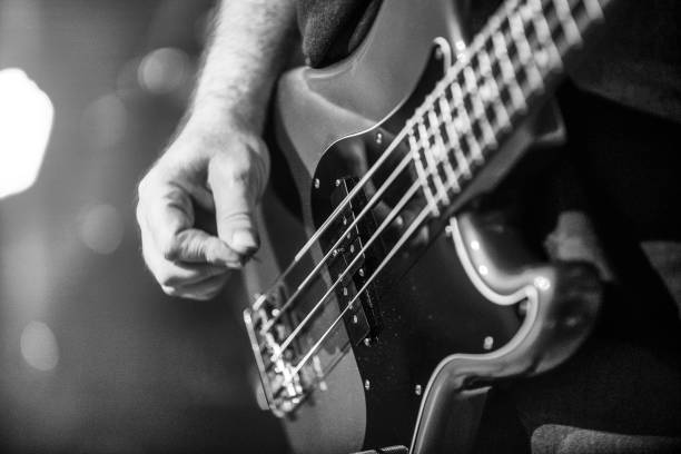istock E-Bass guitar on stage 1185903741