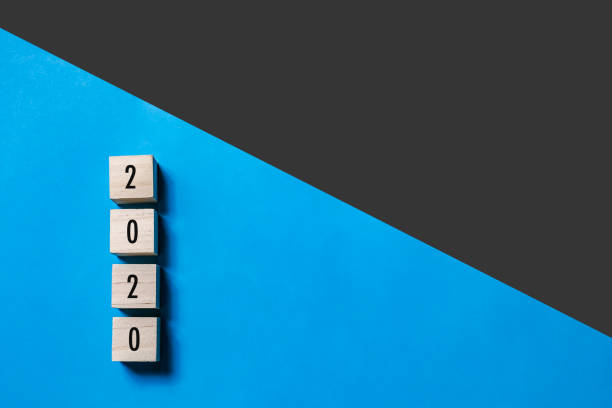 istock New Year concept with 2020 text on wood cube shape, copy space 1185910839