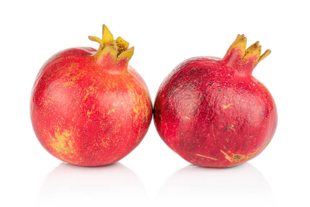 istock Fresh red pomergranate isolated on white 1185914441