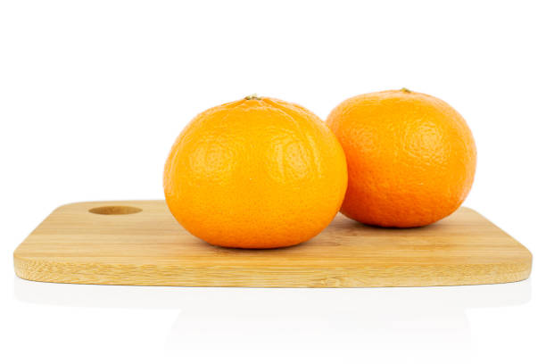 istock Fresh orange mandarine isolated on white 1185914864