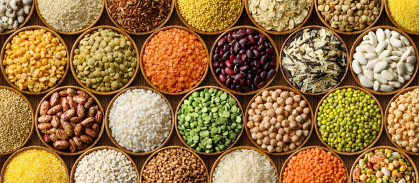 istock Various colorful cereals and legumes background 1185914900