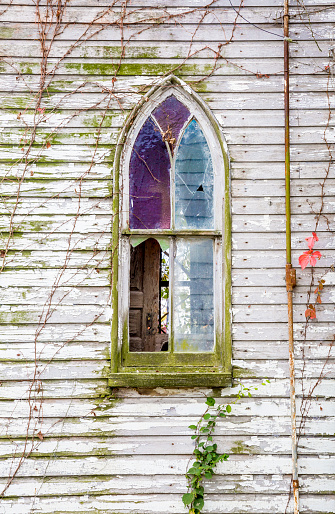 Old Abandoned Church And Broken Stained Glass Window