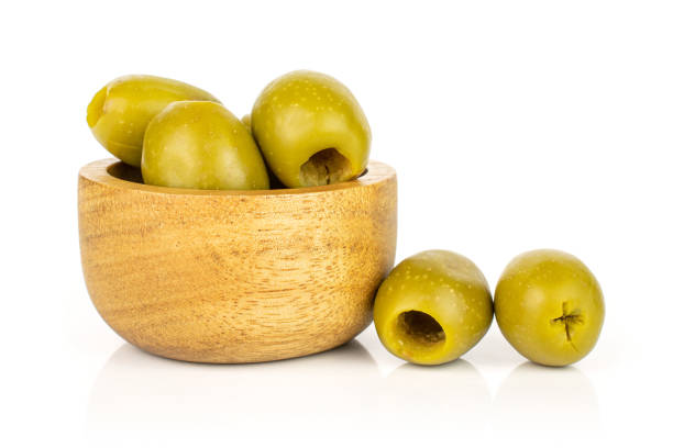 istock Green pitted olive fruit isolated on white 1185919229