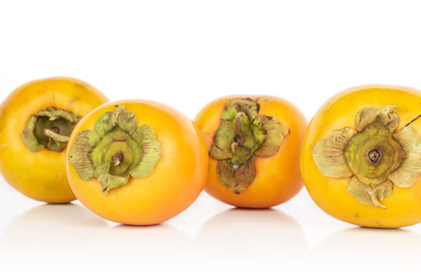 istock Sweet orange persimmon isolated on white 1185920697