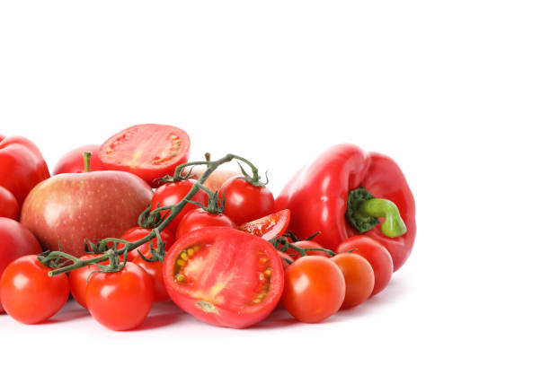istock Tomatoes, apples and peppers isolated on white background 1185923133