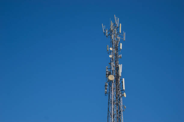 cellular communication antenna tower stock photo