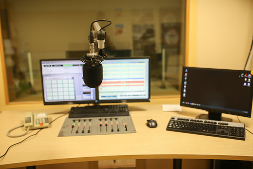 preparing the news broadcast. radio station