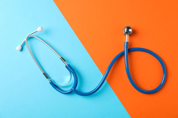 istock Stethoscope on two tone background, space for text. Healthcare 1185927843