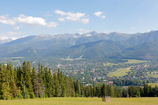 City of Zakopane and Tatras seen from the top of Gubalowka, emphasize the beauty of the Polish Podhale