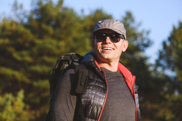 istock Portrait of an elderly man with a backpack 1185931781