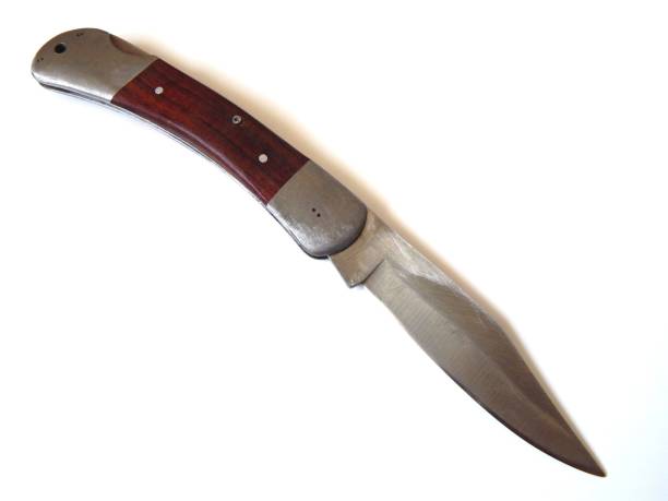 istock Pocket folding knife isolated on a white background close-up. 1185935350