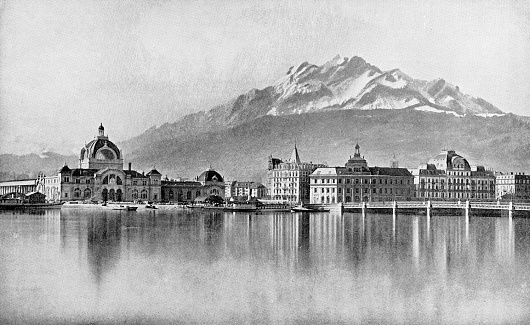 Mount Pilatus and the city of Lucerne in Lucerne Canton, Switzerland. Vintage halftone etching circa late 19th century.