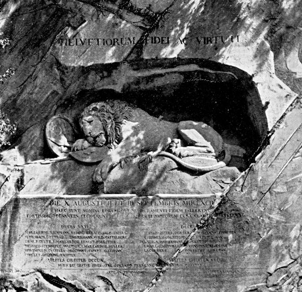 The Lion Monument (Lion of Lucerne) in the city of Lucerne in Lucerne Canton, Switzerland. Vintage halftone etching circa late 19th century.