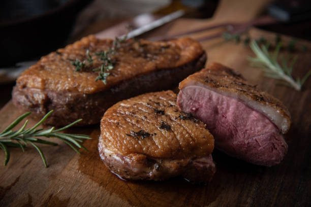istock grilled duck breast meat with skillet 1185939456