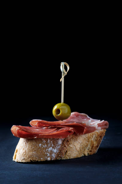 istock Skewer of Iberian ham and olive 1185941921