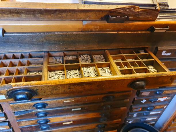 istock Drawer cabinet with metallic letters 1185950575