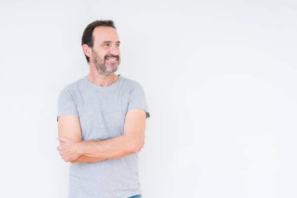 istock Handsome senior man over isolated background smiling looking side and staring away thinking. 1185951780