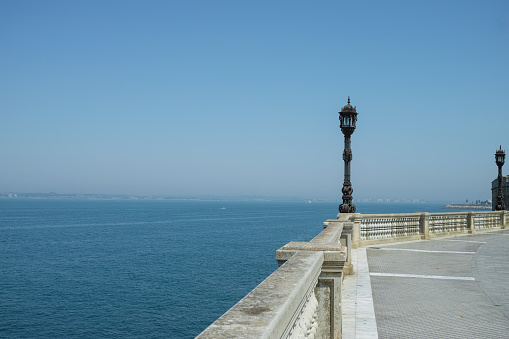 Seafront promenade in one of oldest city in Europe, Cadiz, Andalusia, Spain in summer
