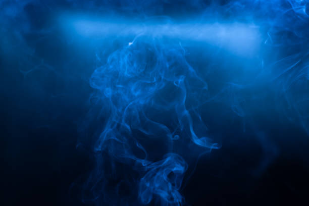 istock Smoke movements background in low blue light 1185954675