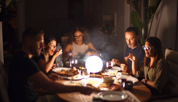 istock Beautiful family on dinner talking and smiling at terrace 1185955270
