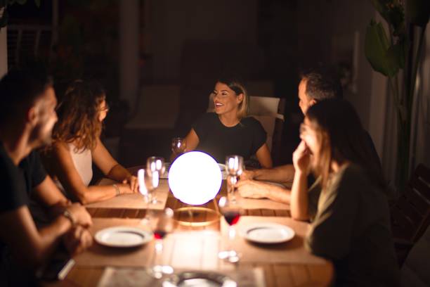 istock Beautiful family on dinner talking and smiling at terrace 1185955294
