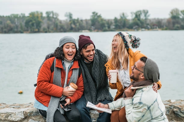 istock Group of friends having fun on the river 1185955612