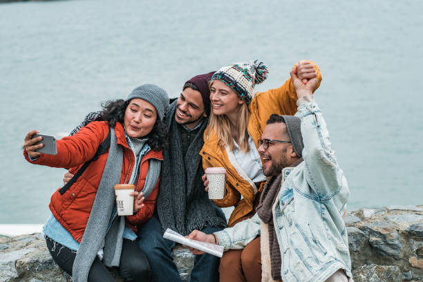 istock Group of friends taking a selfie on the river 1185955828