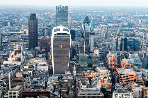 City of London from above, office buildings in financial district, cloudy sky, elevated view, UK.