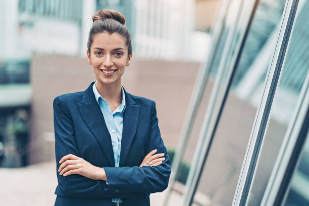 istock Businesswoman by a modern building 1185962172