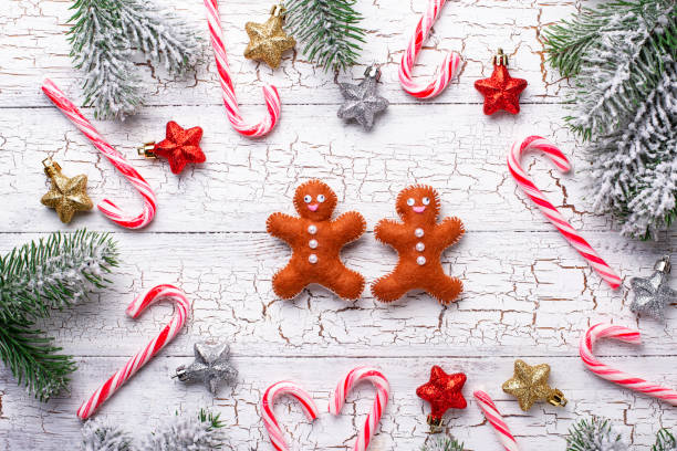 istock Christmas background with felt gingerbread man 1185962423