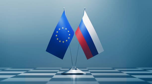 istock European Union and Russian Flag Pair on A Chess Board 1185963384