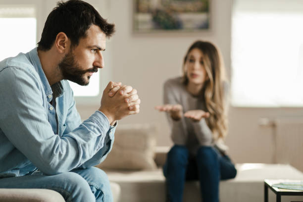 istock Young angry man having relationship difficulties with his girlfriend 1185964396