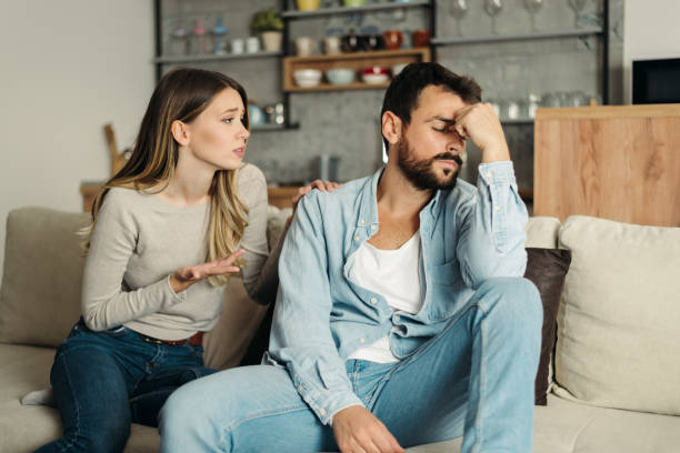 istock Young angry man having relationship difficulties with his girlfriend 1185964433