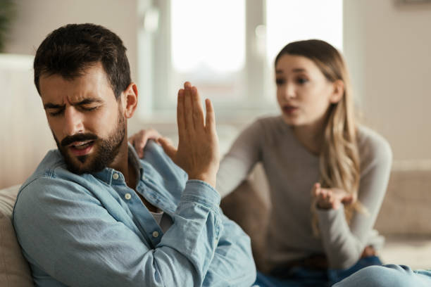 istock Young angry man having relationship difficulties with his girlfriend 1185964465