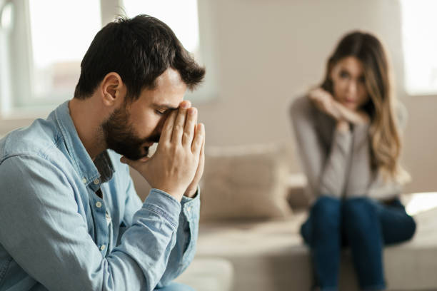 istock Young couple having problems in their relationship at home 1185964571