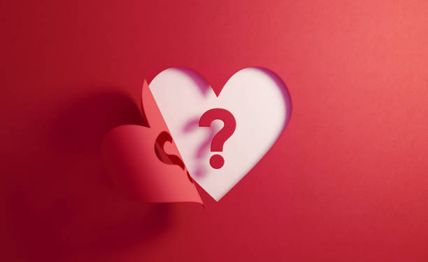istock Uncertainty Concept- Question Mark Inside Of A Red Folding Heart Shape On White Background 1185965641