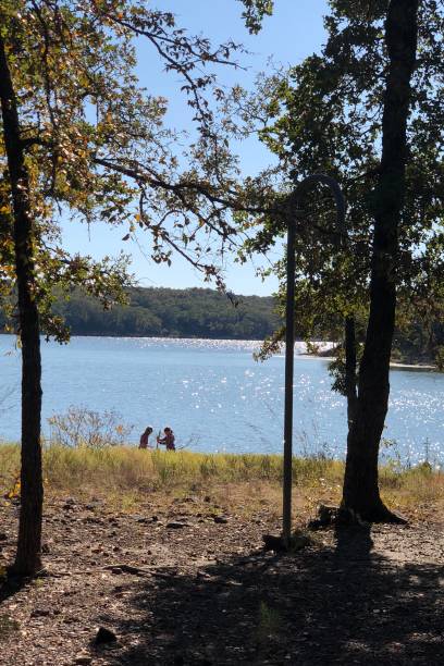 istock Kids at the lake campground 1185971380