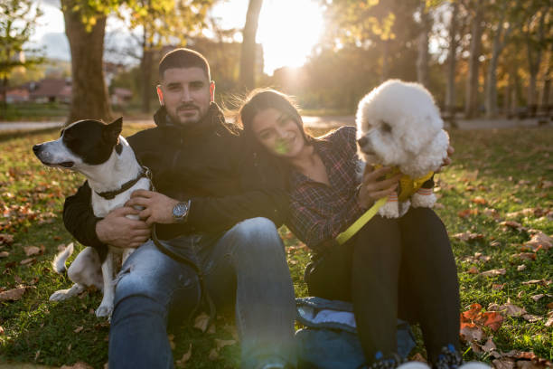 istock young couple with pets 1185974351