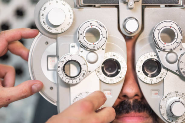 istock Eye ophthalmologist exam. Eyesight recovery. Astigmatism check concept. Ophthalmology diagnostic device. 1185976257