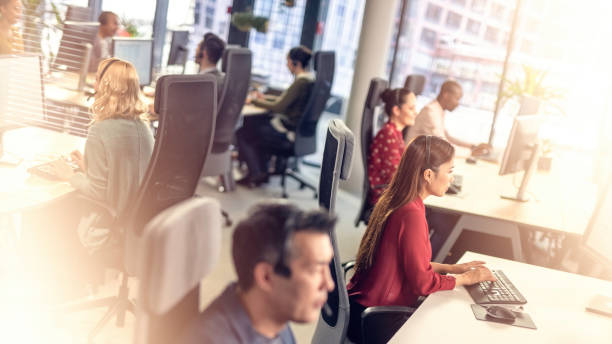 istock People surveying voters in a call centre office 1185978265